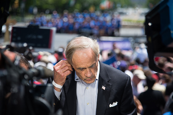 Delaware Senator Tom Carper speaks to the media before Joe Biden makes his announcement.