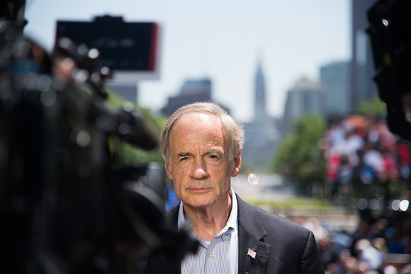 Delaware Senator Tom Carper speaks to the media before Joe Biden makes his announcement.