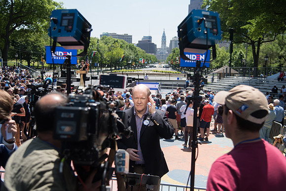 Delaware Senator Chris Coons  speaks to the media.