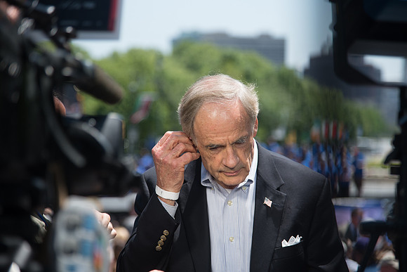 Delaware Senator Tom Carper speaks to the media before Joe Biden makes his announcement.