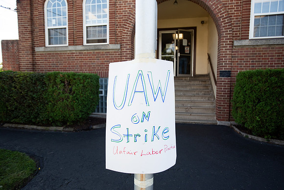 A sign outside of the UAW 1097 Union hall in Rochester NY proclaims a strike.