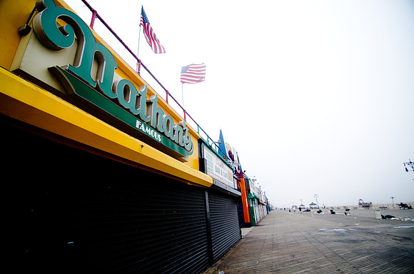 The famous Coney Island boardwalk is shuttered in preparation for Irene.