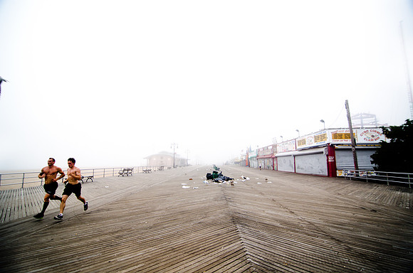 The famous Coney Island boardwalk is shuttered in preparation for Irene.