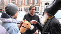 Vermin Supreme talks to a voter.