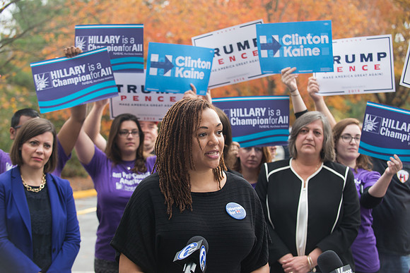 Planned Parenthood speaks outside the Melania rally.