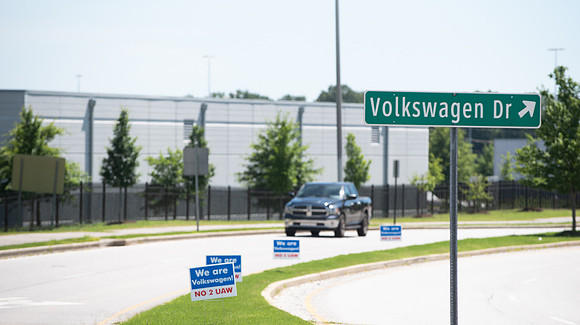 Pro-Union signs along the road outside of the Chattanooga Volkswagen plant before the vote in June